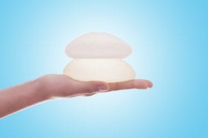 Silicone breast implant on hands-img-blog