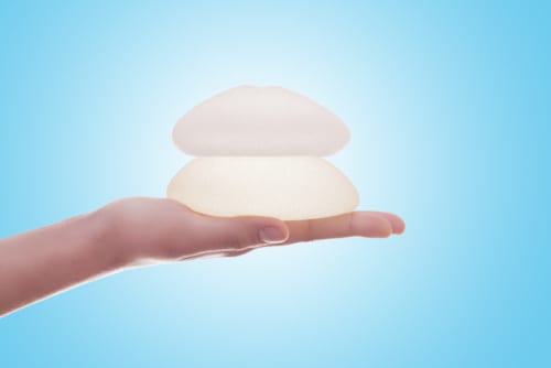 Silicone breast implant on hands-img-blog