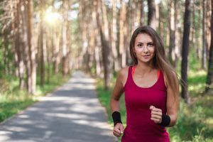 Young woman running in the park