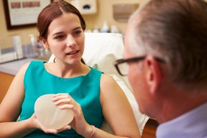 Woman talking to doctor about Breast Implants